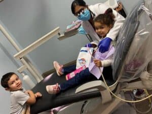 Girl on a dentist chair